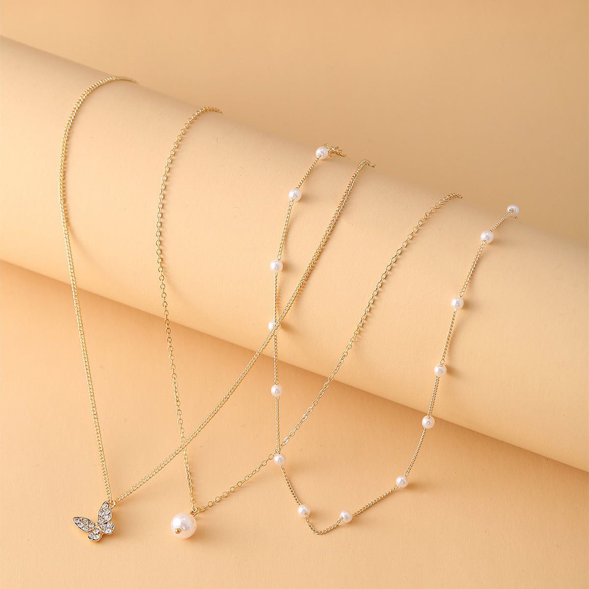 Retro multi-layered clavicle simple butterfly pearl pendant bead alloy chain