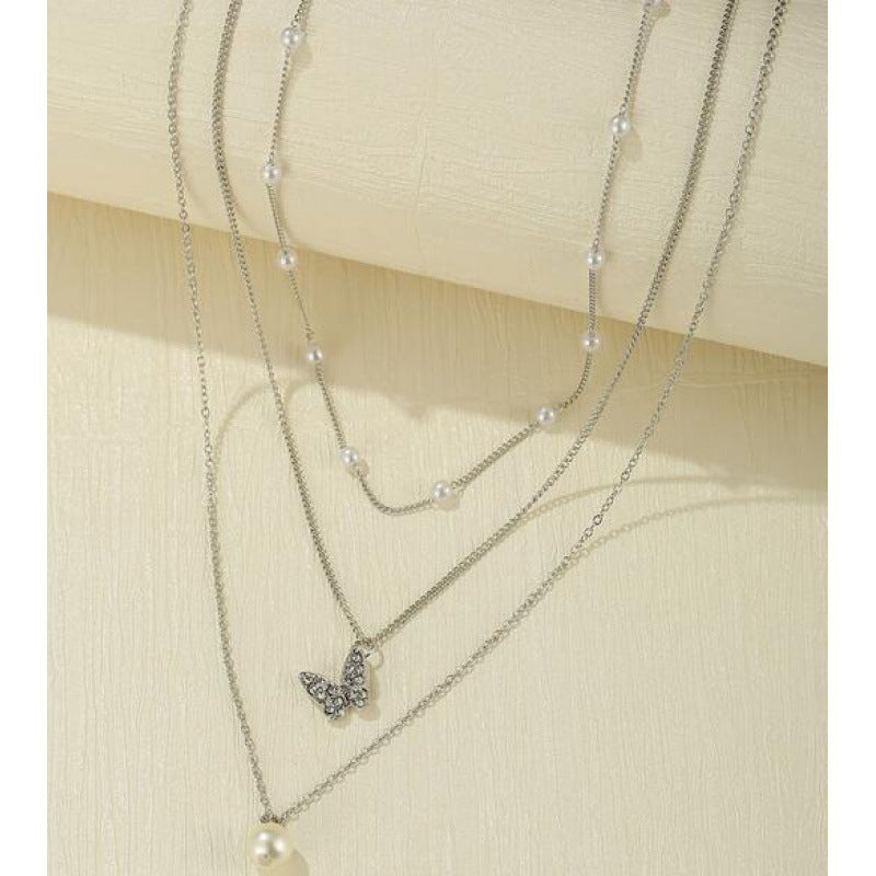 Retro multi-layered clavicle simple butterfly pearl pendant bead alloy chain