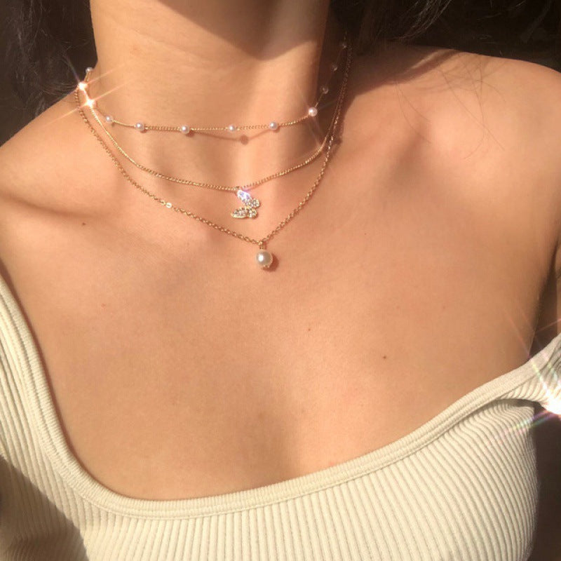 Retro multi-layered clavicle simple butterfly pearl pendant bead alloy chain