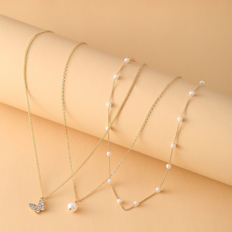 Retro multi-layered clavicle simple butterfly pearl pendant bead alloy chain